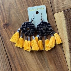 2/$8 Bronze Earrings with Mustard Yellow Tassels.